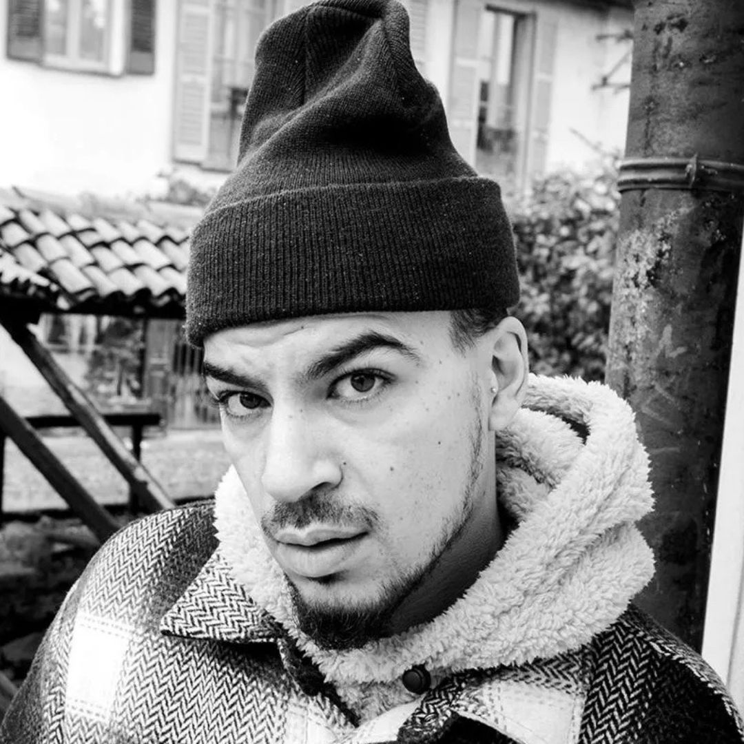 Beatmaker and Music Producer JayBee Vibes Portrait shot in Milan's Navigli district, Italy.