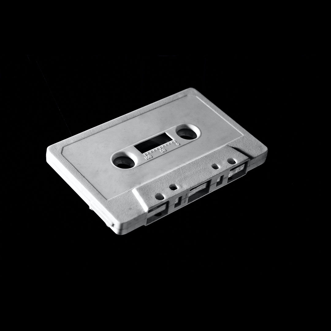 white blank cassette tape against black background hip-hop mixtapes history