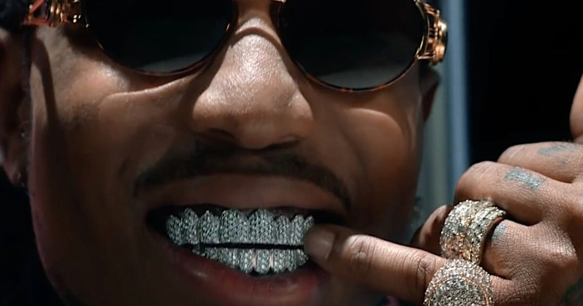 Rapper Quavo wearing diamond grillz