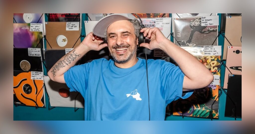 Esa FunkPrez shot live during deejay set in Milan, with a background full of records