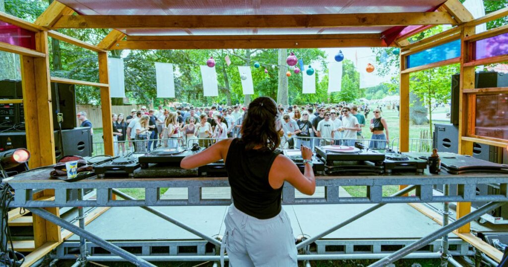 DJ Paulita playing at an open-air gig